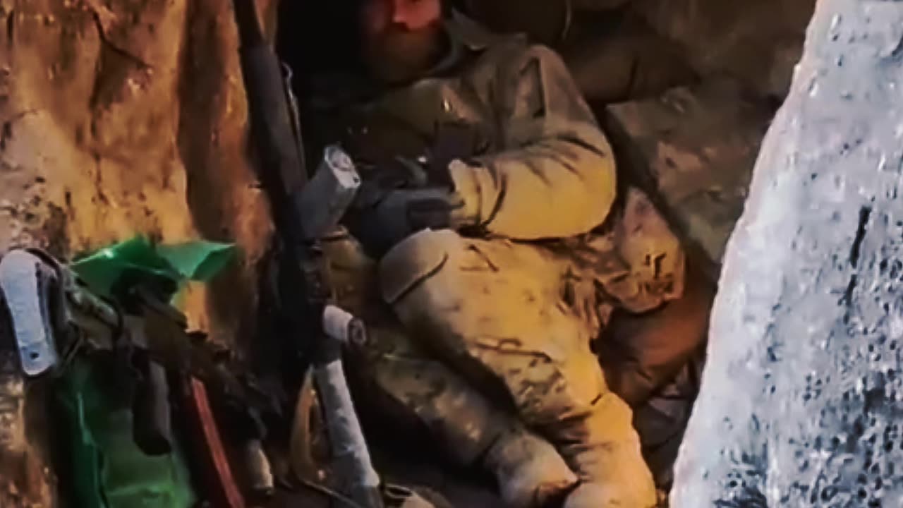 Ukrainian Soldier is Partially Buried After Shell Lands Nearby During Assault on Russian Trenches