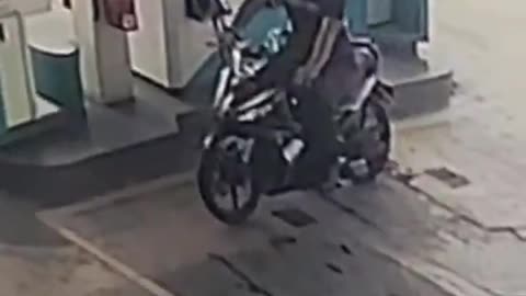 Motorcycle caught fire at gas station