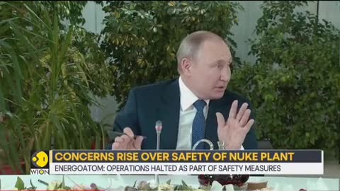 PUTIN, MACRON HOLD S OVER NUKE PLANT ןU Aט מTOR aTELNUFPA