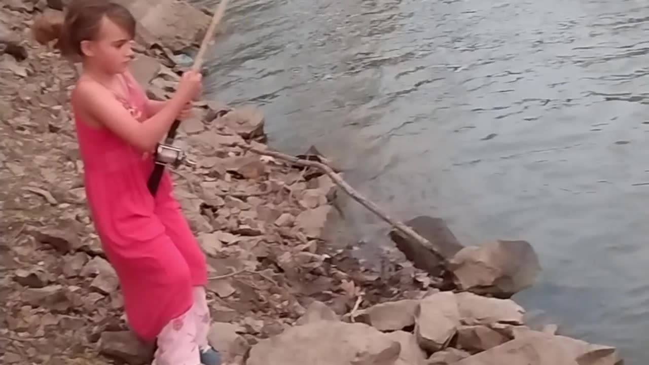 Rally Catches A Catfish Bigger Than Her