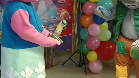 Trolls play ring toss with Mr dingles game in Pasadena Texas at birthday party with poppy & branch