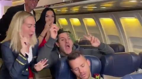 Amazing | She Proposes To Him In An Airplane