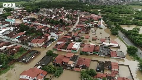 Dams burst in Brazil as deadly flooding continues - BBC News