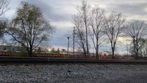 5 CSX Engines pulling mixed freight