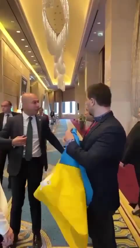 In Turkey, a Russian delegate tore the flag of Ukraine out of the hands of MP