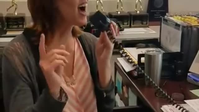 NC school receptionist belt out a song over intercom on last day of school