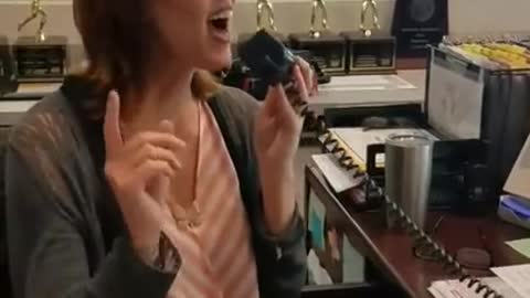 NC school receptionist belt out a song over intercom on last day of school