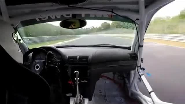 The first view of racing drivers driving racing cars