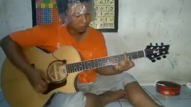 Alip ba ta guitar master from Indonesia