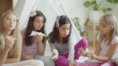 girls eating snack