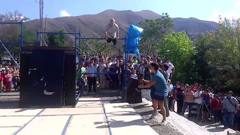 Guy Faceplants Doing A Front Flip Off A Bar