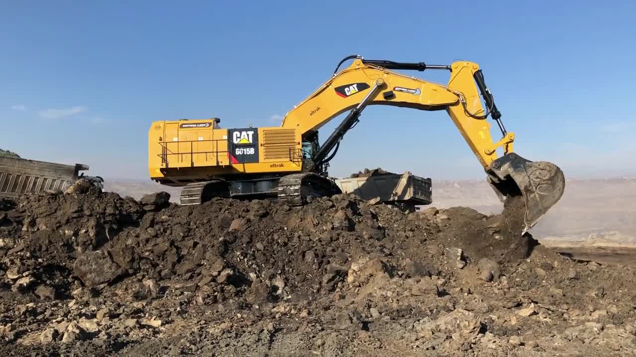 Caterpillar 6015B Excavator Loading Trucks With Two Passes - Sotiriadis Mining Works