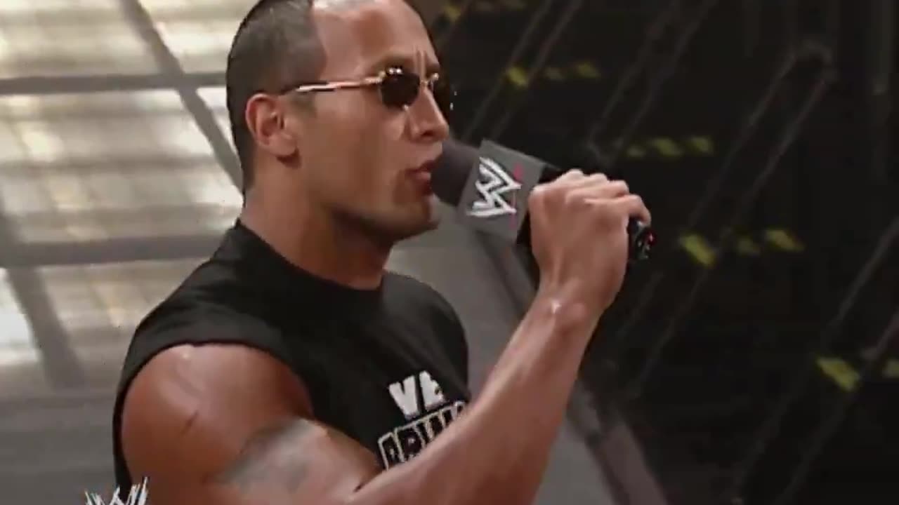 That time The Rock destroyed Brock Lesnar and Triple H in just one promo.