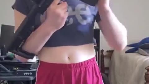 Democrat In Action - Transgender Making Veiled Threat With Firearm