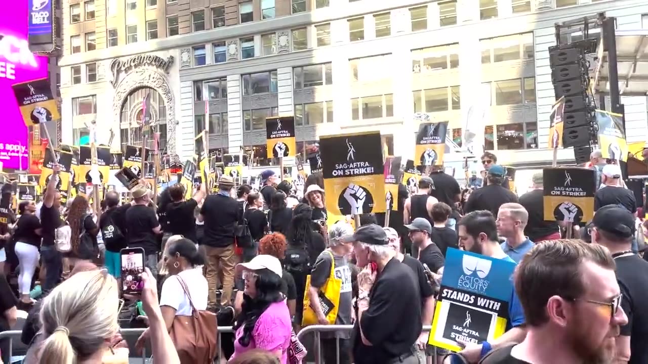 Striking writers and actors rally in New York's Times Square