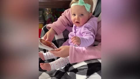 Funniest -baby-try-to-read-what-s-new-baby-cutie-babies