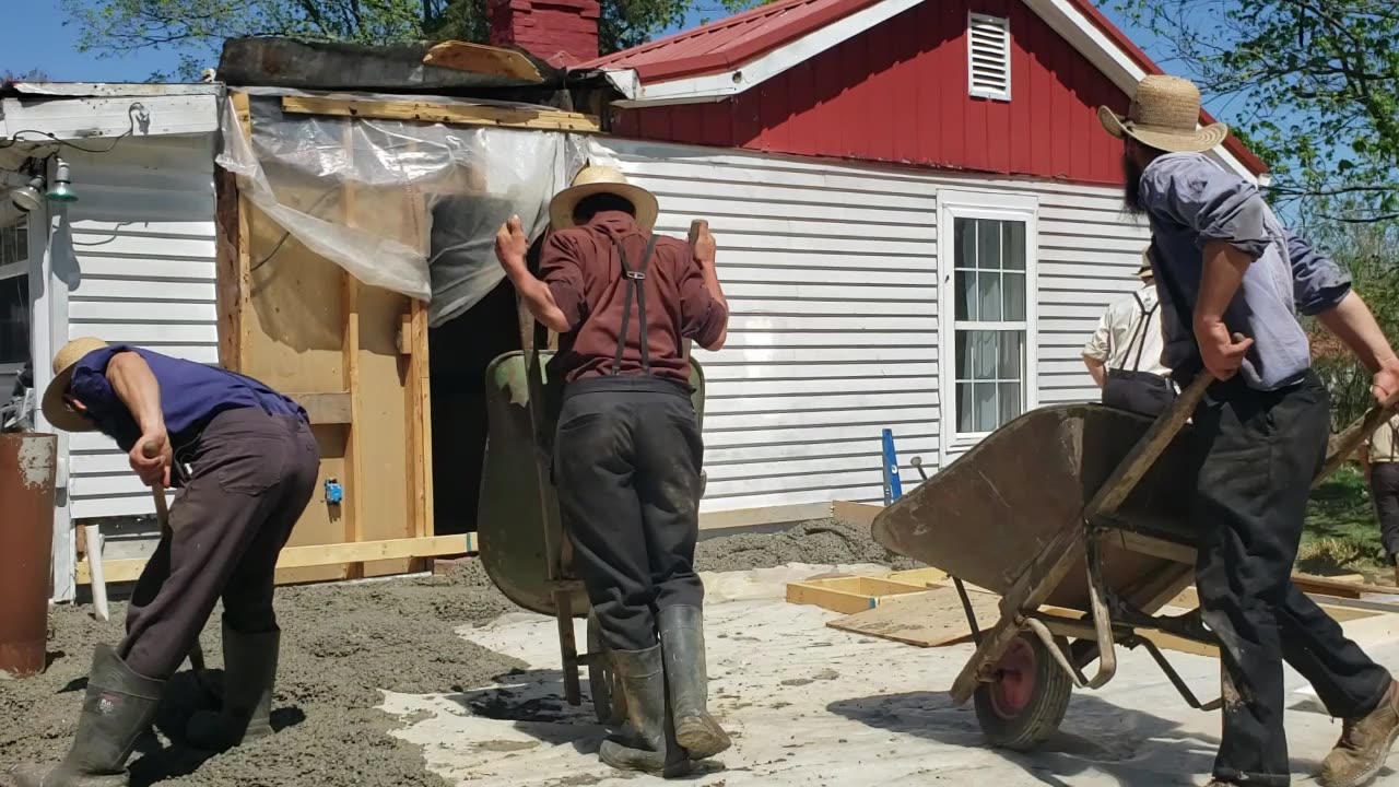 MENNONITE NEIGHBORS KNOW HOW TO QUICKLY WORK WET CEMENT