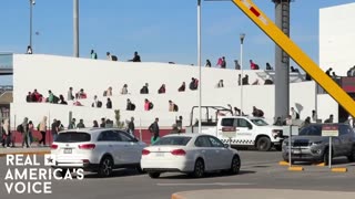 TODAY: Footage from Tijuana Mexico shows large groups of illegal aliens being Brought into the US