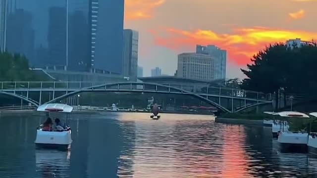 The Boat and the Setting Sun