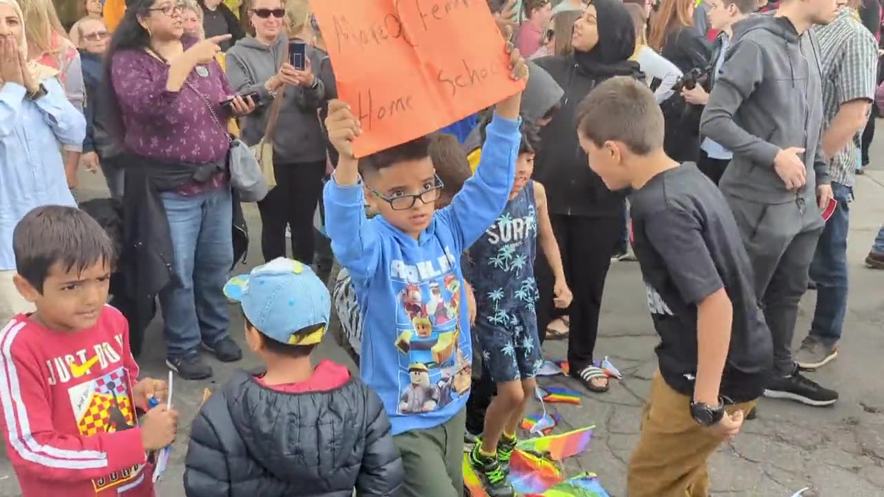 Muslim Kids Stomping On The Gay Flag As Their Parents Cheer Them On.