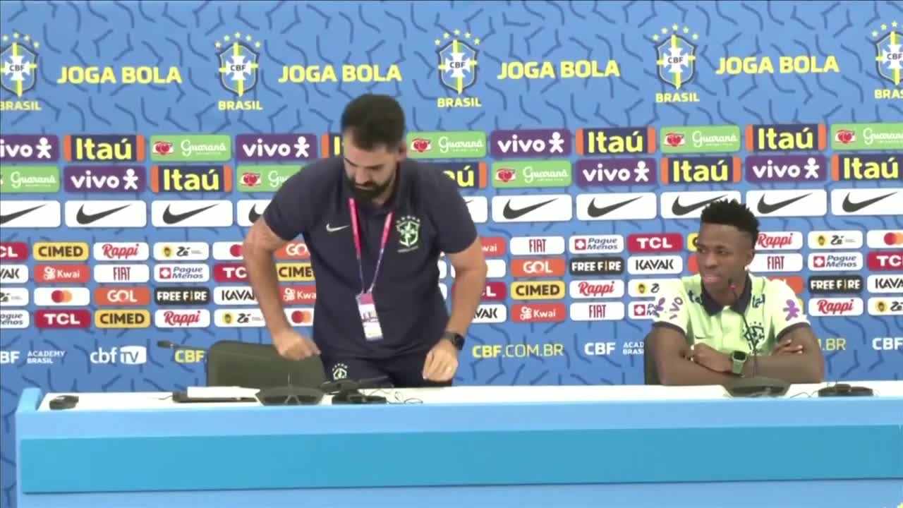 Brazil staff member removes cat after it interrupts Vinicius Jr