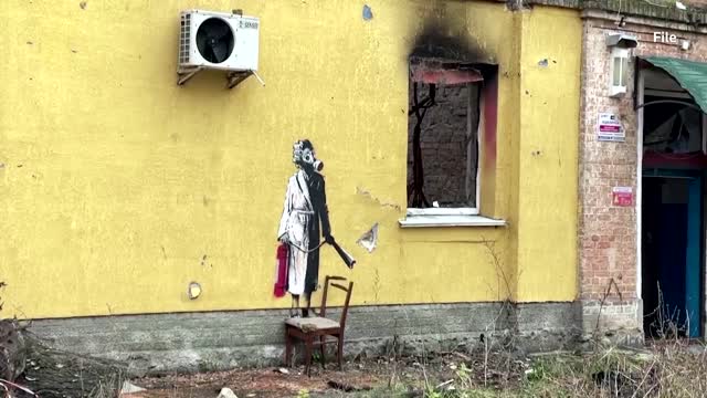 Ukrainian city retrieves Banksy mural cut off wall