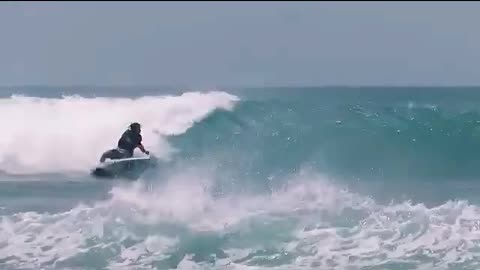 Surfing on the beach