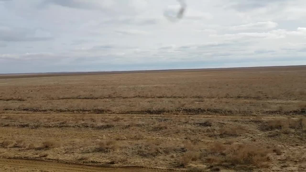 Train window view of Steppes from Almaty - Aktau