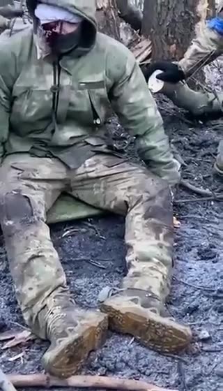 Injured Russian Surrenders After Being Left behind