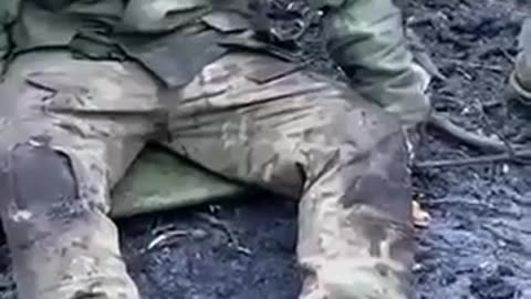 Injured Russian Surrenders After Being Left behind