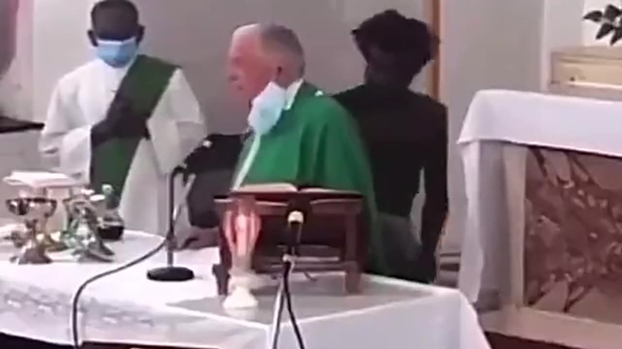 Man slaps Priest Before Taking Bible