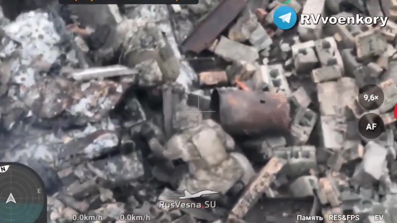 Two Russian FPV drones launch an attack on a Ukrainian position, causing the roof to collapse.