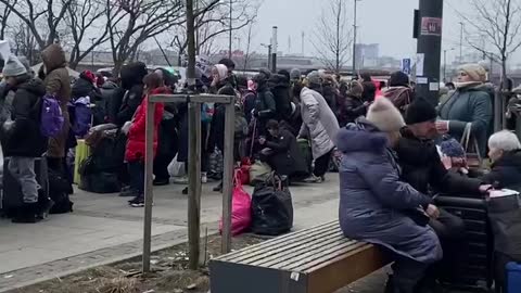 The queue for evacuation trains to Poland at the railway station in Lvov