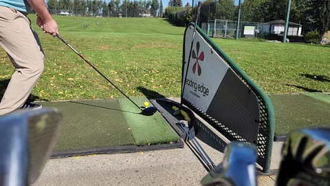 Testing new stance at driving range