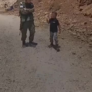 Palestinian Kid Arguing with ISRAELI SOLDIER