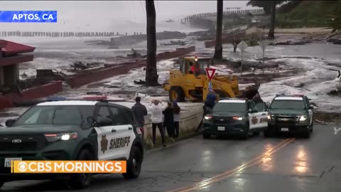 Massive waves pound California coastline, flooding streets