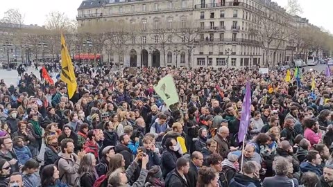 Thousands of people protest in front of the town hall in Paris against police