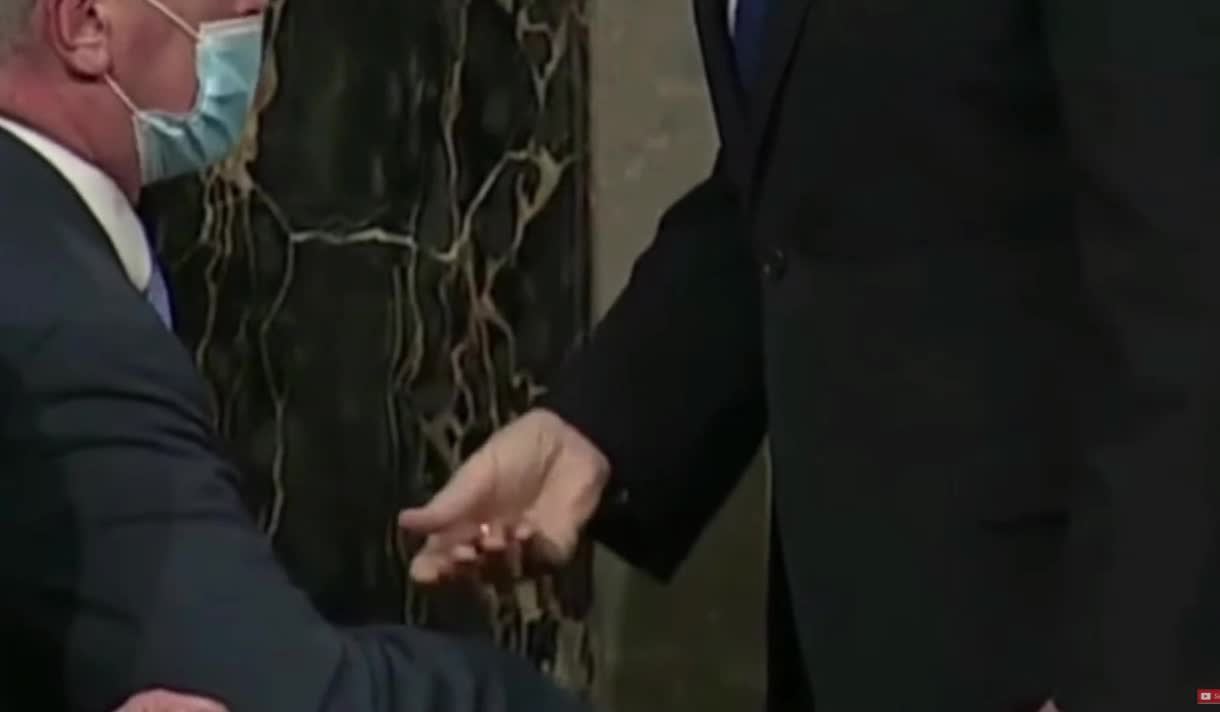 Pence getting his coveted Masonic coin.