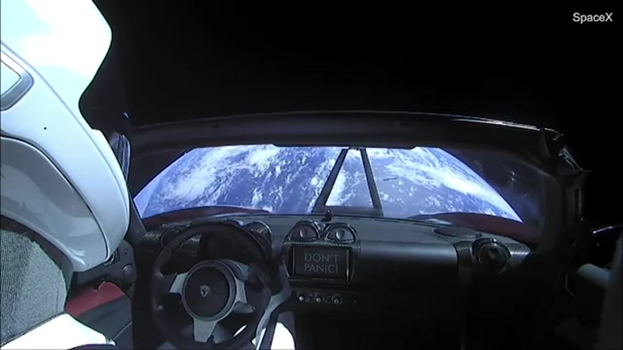 Tesla Roadster Flying Free in Open Space