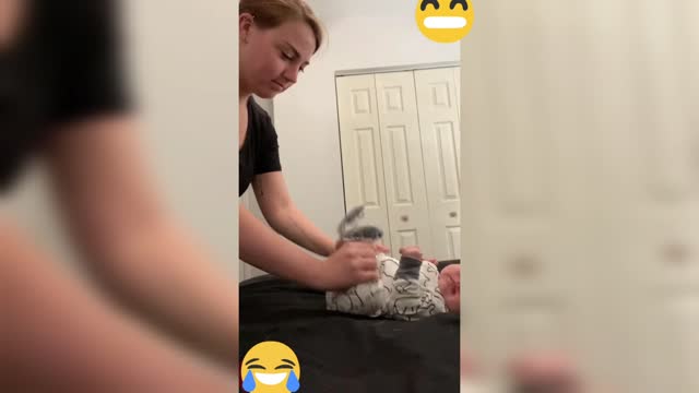 Funny video of a mother massaging her child