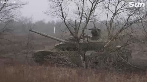 Russian tanks storm battlefield and blast Ukrainian positions