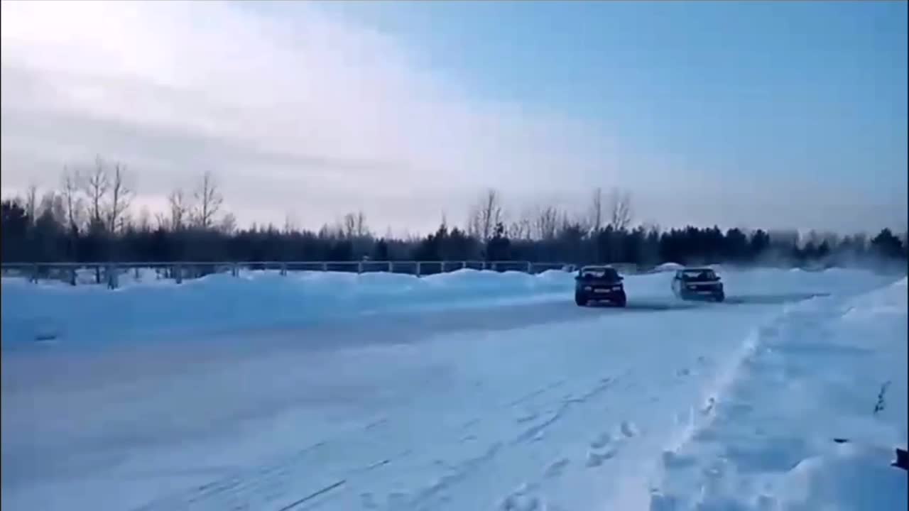 Two Drifting Cars Slide into Snow and Overturn