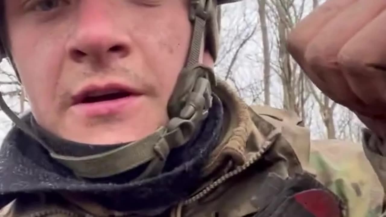 Ukrainian soldier's dragging deceased comrade from the front