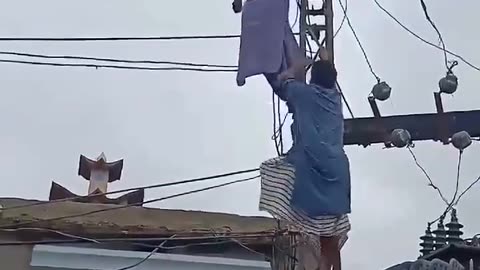 A lineman caught by electric current