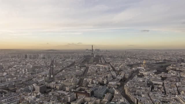 Paris in France and Eiffel tower aerial view from morning to night time lapse