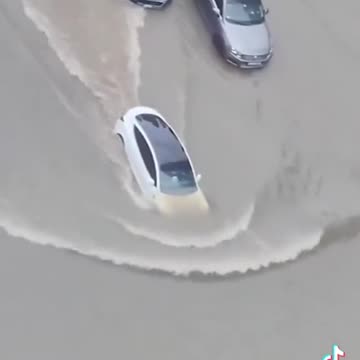 Are the rains and floods in Dubai caused by climate change or weather modification?