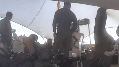 Hamas man films IDF personnel, tents and equipment