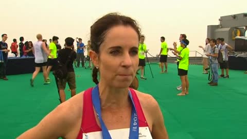 Hundreds of runners compete to conquer Beijing's tallest building