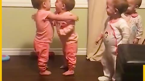 Adorable Babies giving Hugs