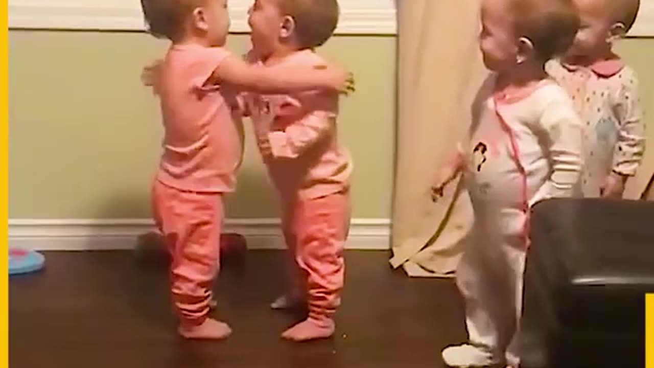 Adorable Babies giving Hugs